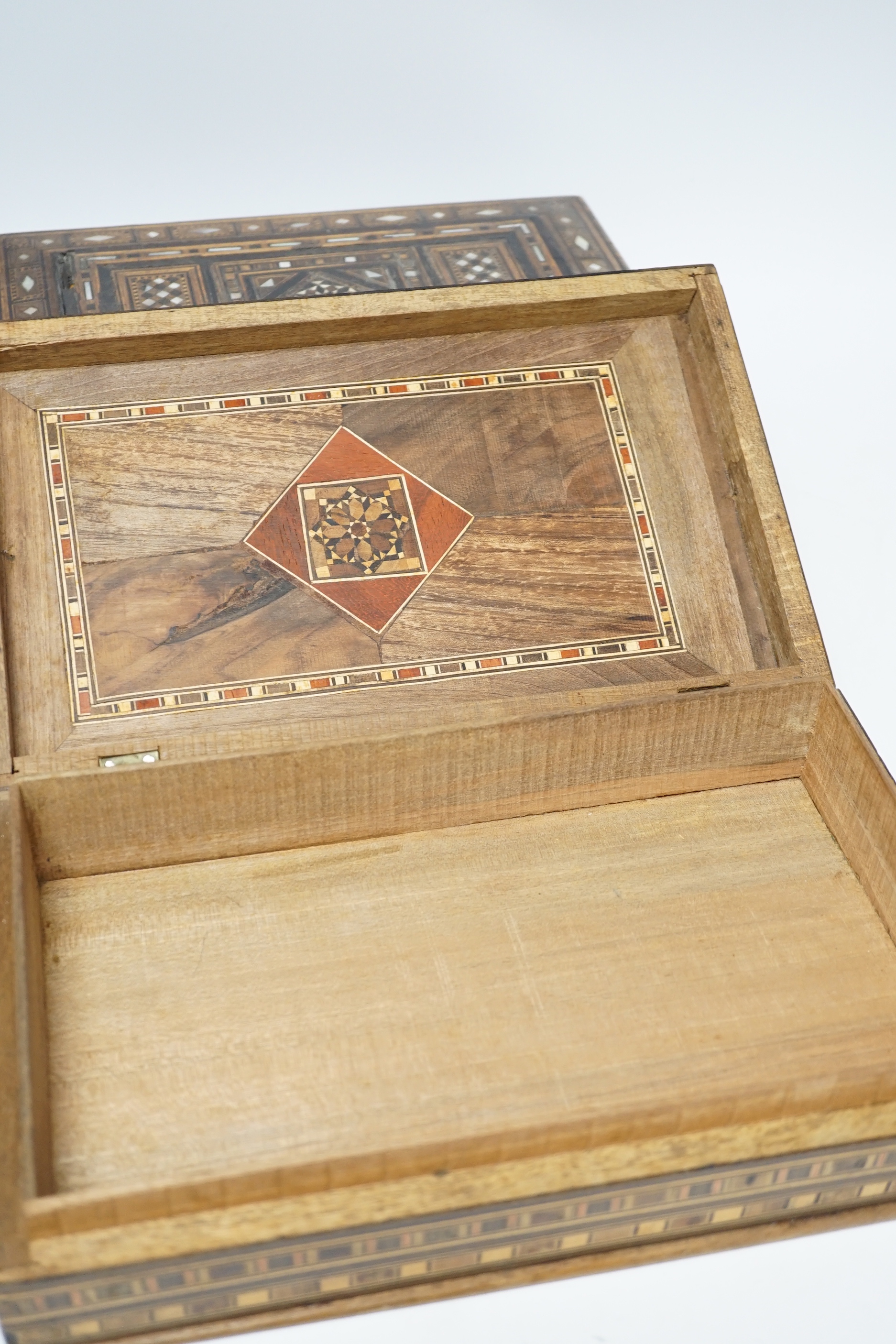 Two Damascus ware mother-of-pearl inlaid boxes, largest 29cm